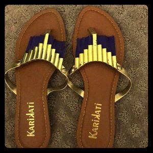 Gold and purple sandals